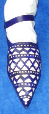 Shoe with extensive geometric openwork Hand-stitched Footwear